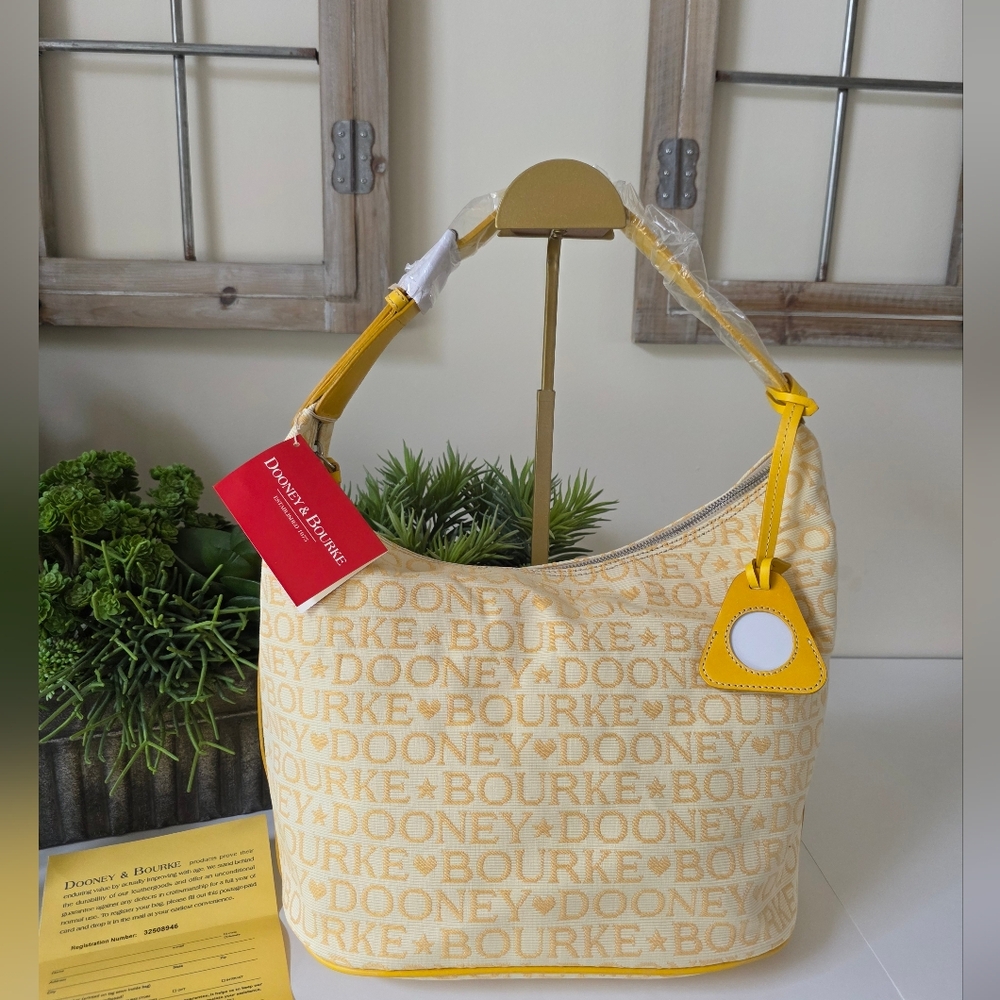 Dooney & Bourke Large Bucket Bag Sunflower Logo Canvas Leather Trim- New - Picture 2 of 16